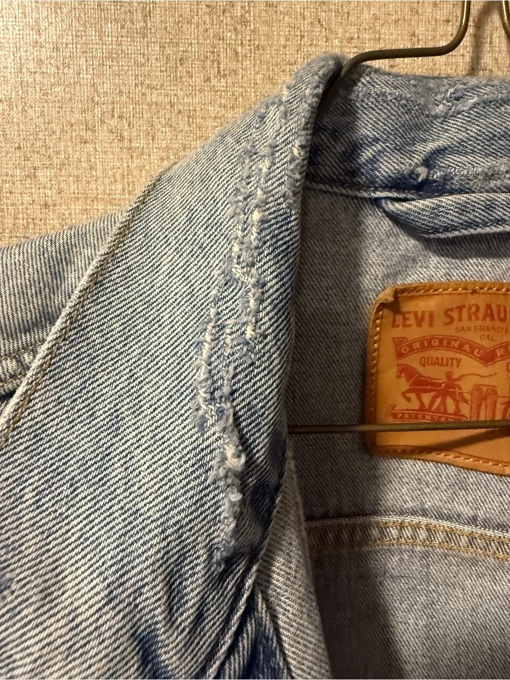 Levi's Light Wash Distressed Denim Trucker Jacket - Men's size Large